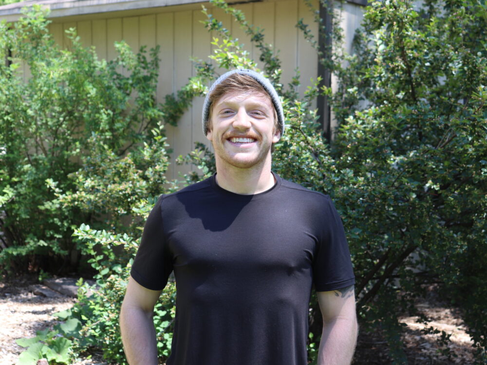 An outdoor portrait of Tai Bloch